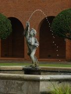 sculpture of an angel with a fountain