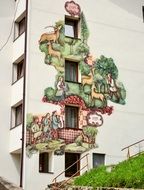 artistic drawing on the facade of a house