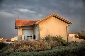 house on the coast under the morning sun