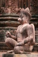 ancient sculpture of a fairy creature