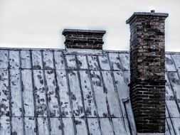 chimney on the roof of the building