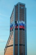 Moscow skyscrapers glass facade flag