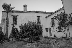 white stone house in the countryside