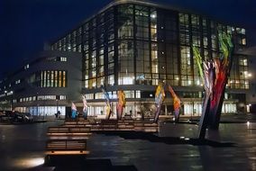 cityscape of modern hospital building at night