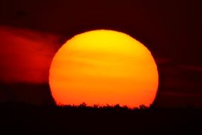fiery sun over Krakow at sunset