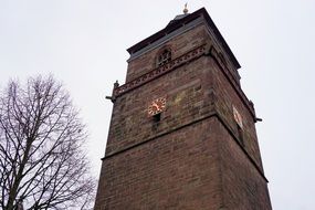 clock on the church tower, germany, grebenstein