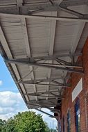 metal Roof Construction on a brick building