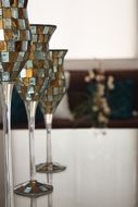 mosaic glasses on the table in the house