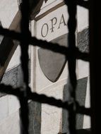 lattice on the window of the catholic church in Tuscany