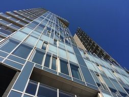 commercial building with panoramic windows, bottom view
