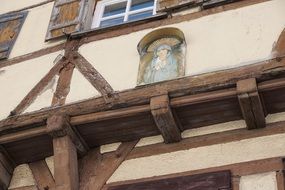 Maria icon in the window of fachwerkhaus