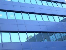 blue windows on a modern facade