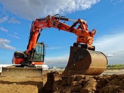 excavator with huge bucket on construction site