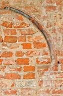 red brick wall with plaster