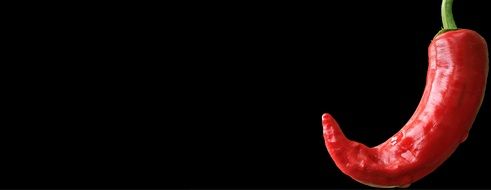 black background with red pepper