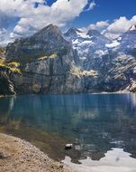 blue lake in the alps in switzerland