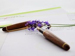 purple lavender and fountain pen