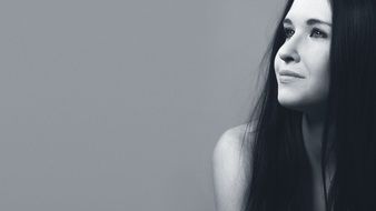 Black and white portrait of a beautiful model with long hair