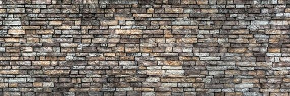 wall of bricks of different sizes