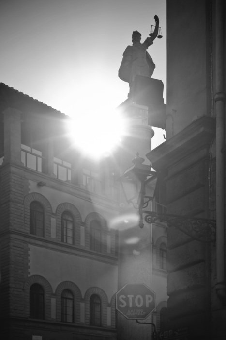 black and white photo of the monument near the building