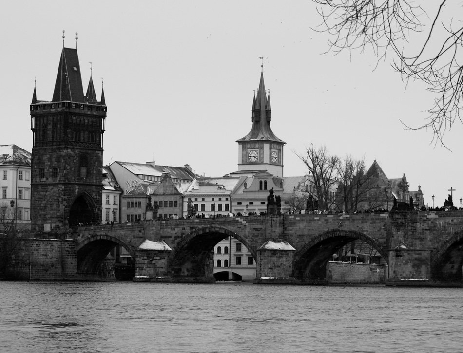 monochrome picture of historic charles bridge in prague