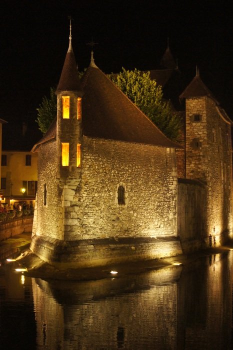 night illumination of the romantic tower in Annecy
