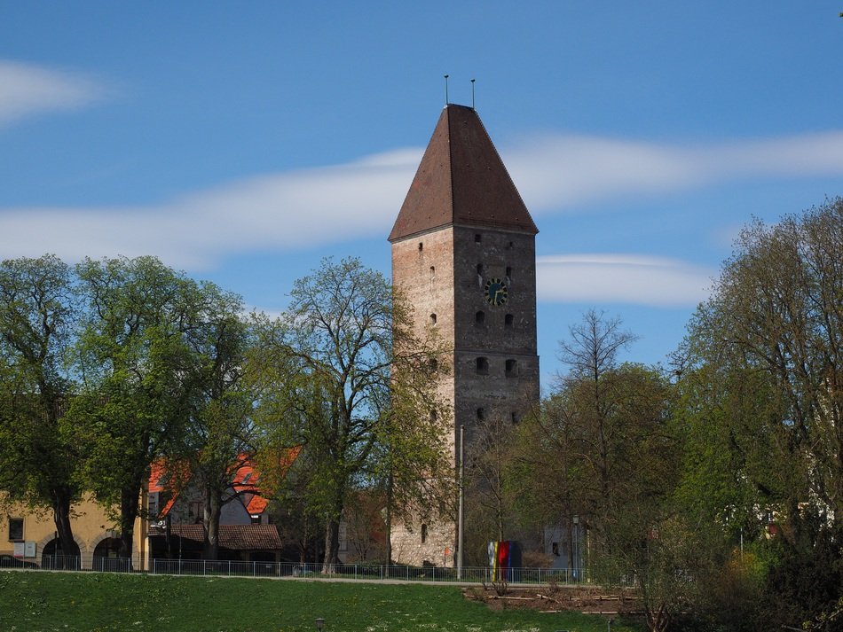 green trees near the tower near the Danube river