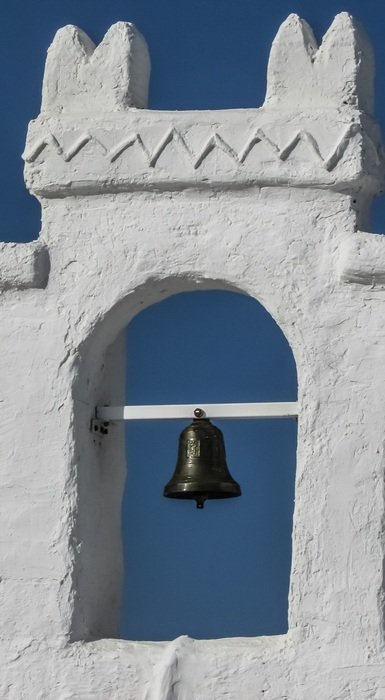 the bell on the wall of the tavern