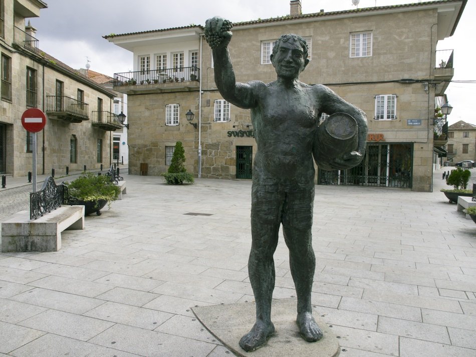bronze statue in a square in spain
