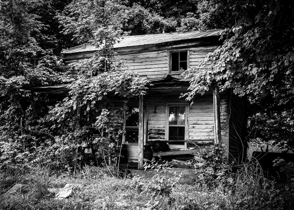 black and white picture of a rural house
