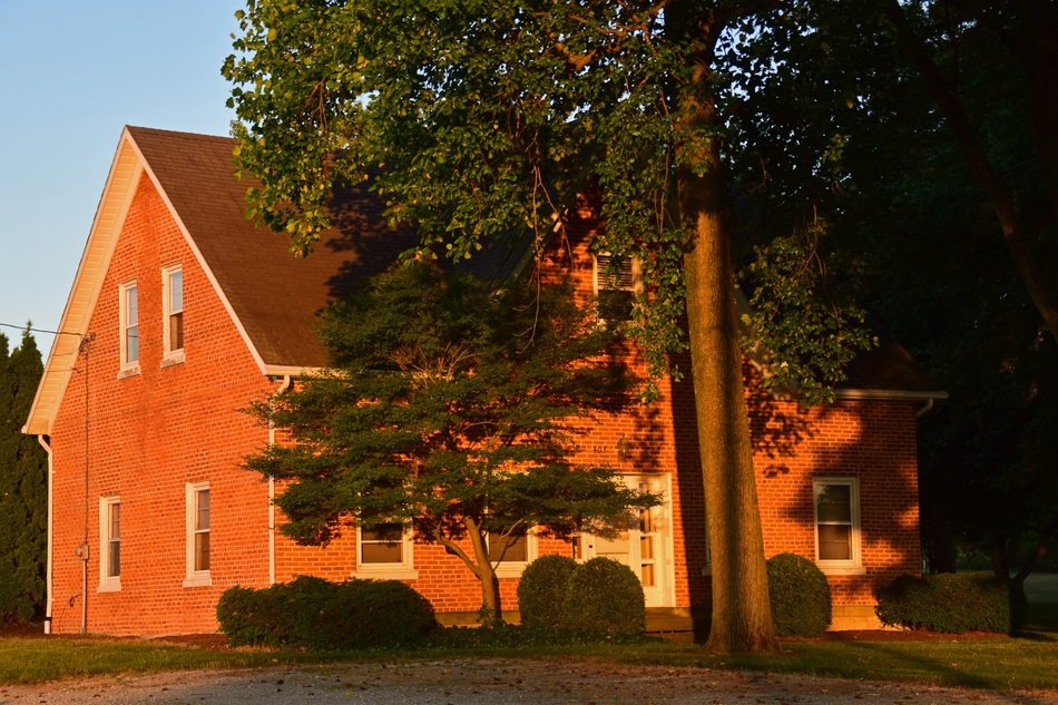 Farmhouse at the sunset light
