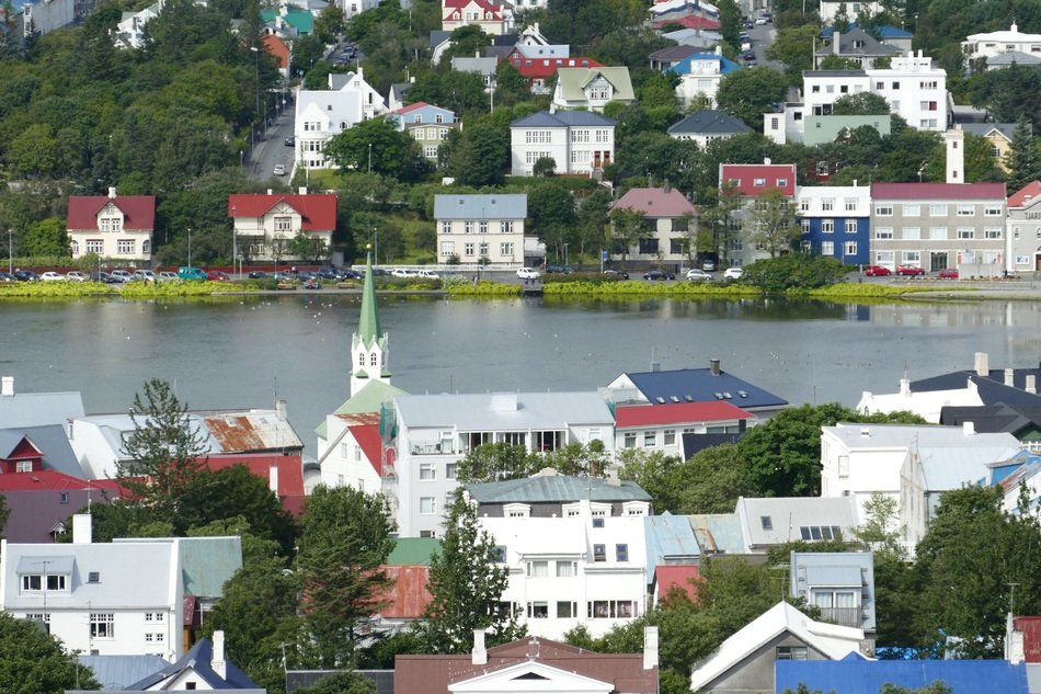 church and houses near the lake