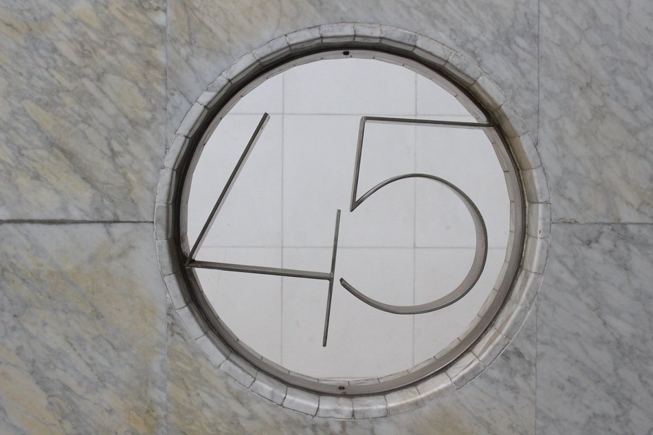 '45' as a number on sign on a wall
