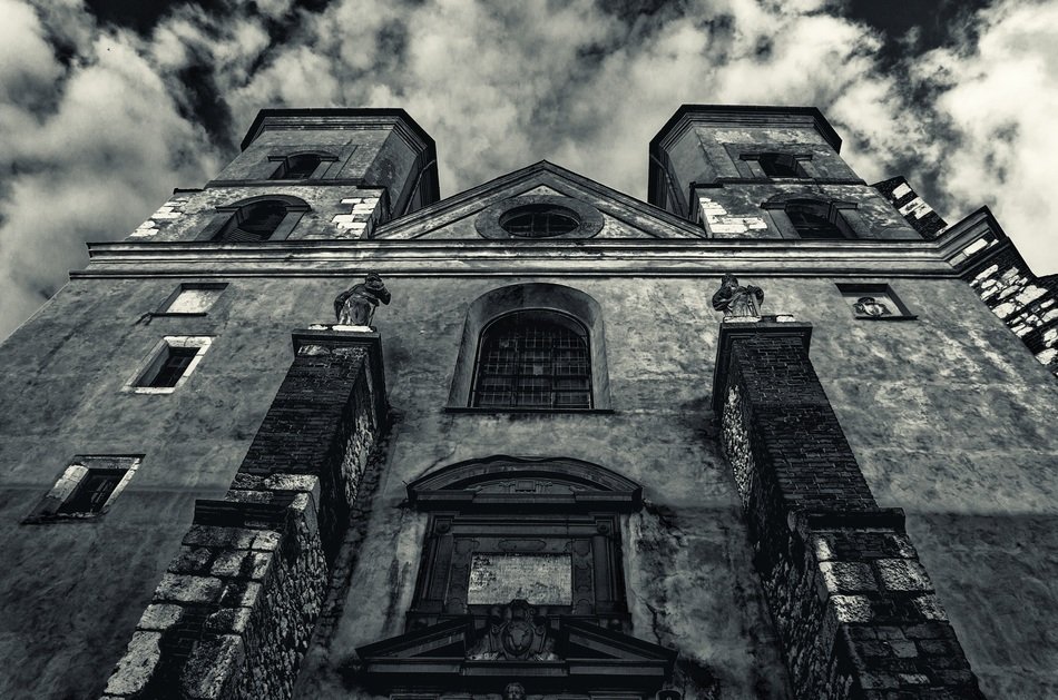 medieval building in krakow in gloomy background