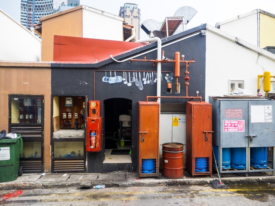 home with kitchen along a road in singapore