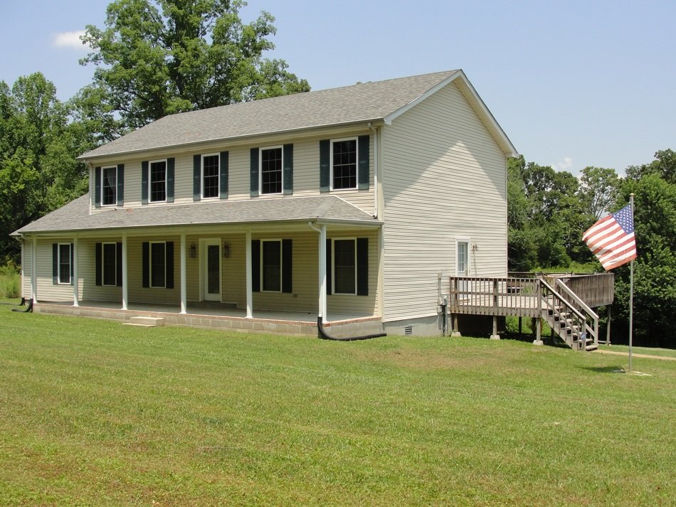 american colonial house and lawn