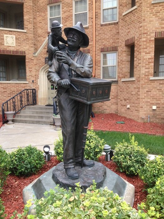bronze statue of the organ grinder at the Senate hotel in Kansas
