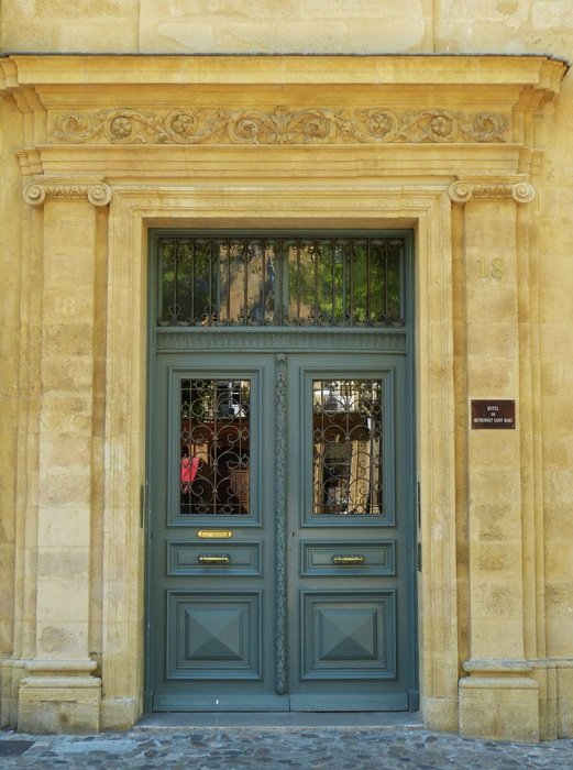 wooden door of HÃ´tel de Meyronnet Saint-Marc, france, provence