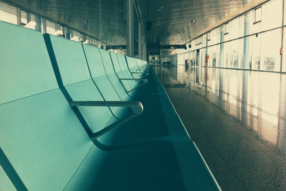 perspective photo of seats in the hall of the modern airport