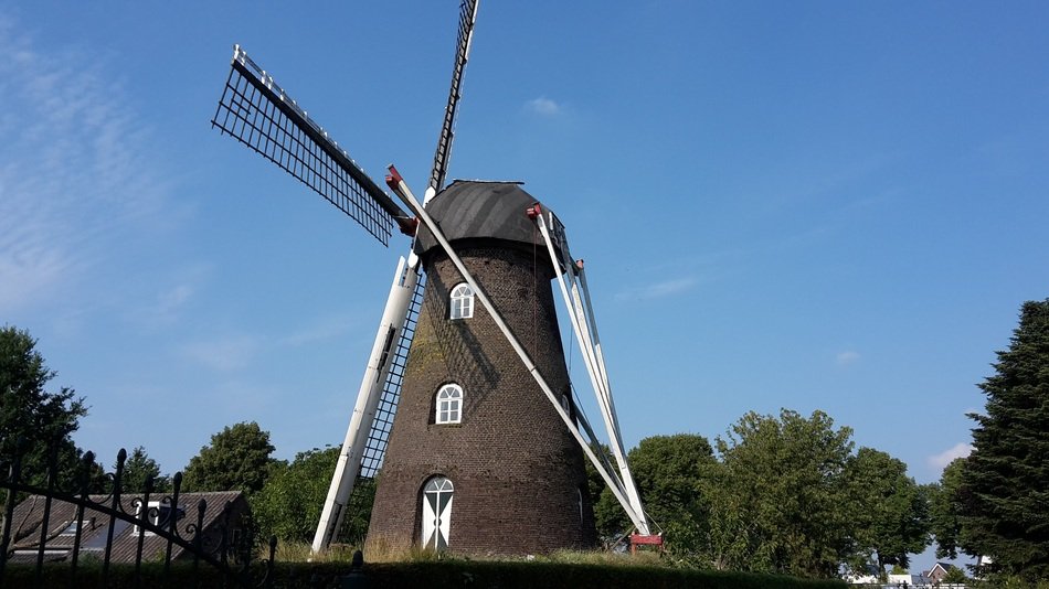 landscape of windmill amid beautiful scenery