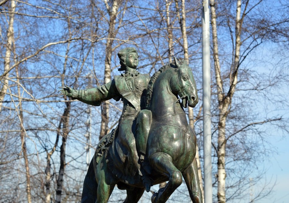 Monument to the horseman on horseback during the time of Catherine 2 among the plants