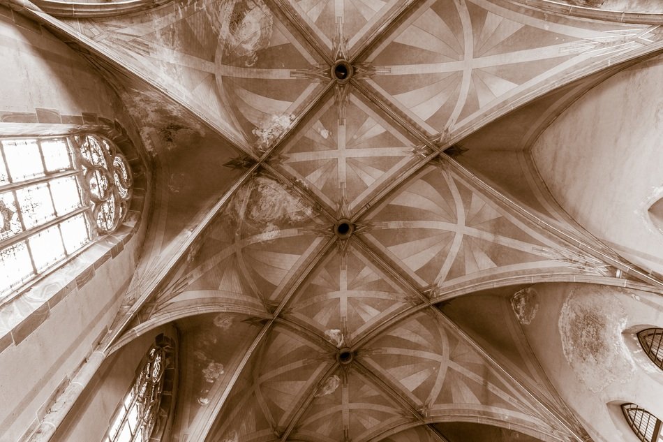 brown ceiling with a pattern in the chapel