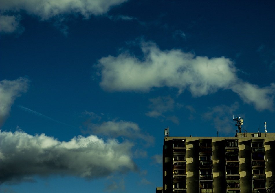 white clouds over the house