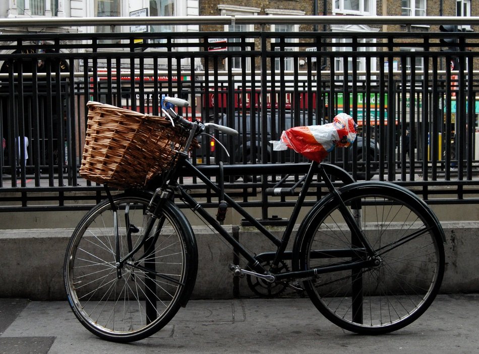 bike with a basket in the parking lot