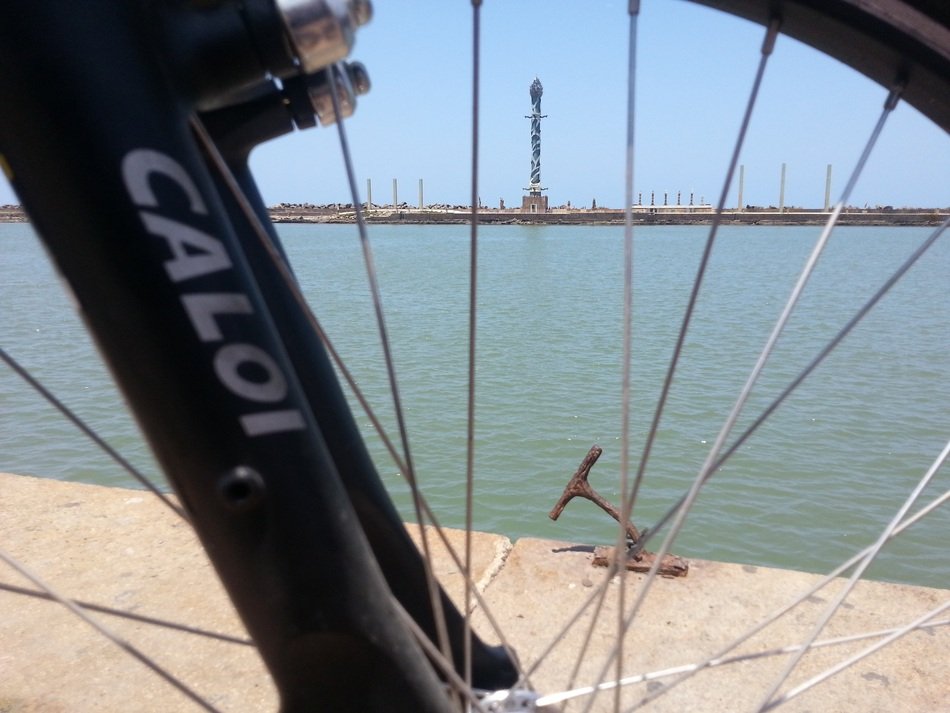 panorama of the river through a bicycle wheel