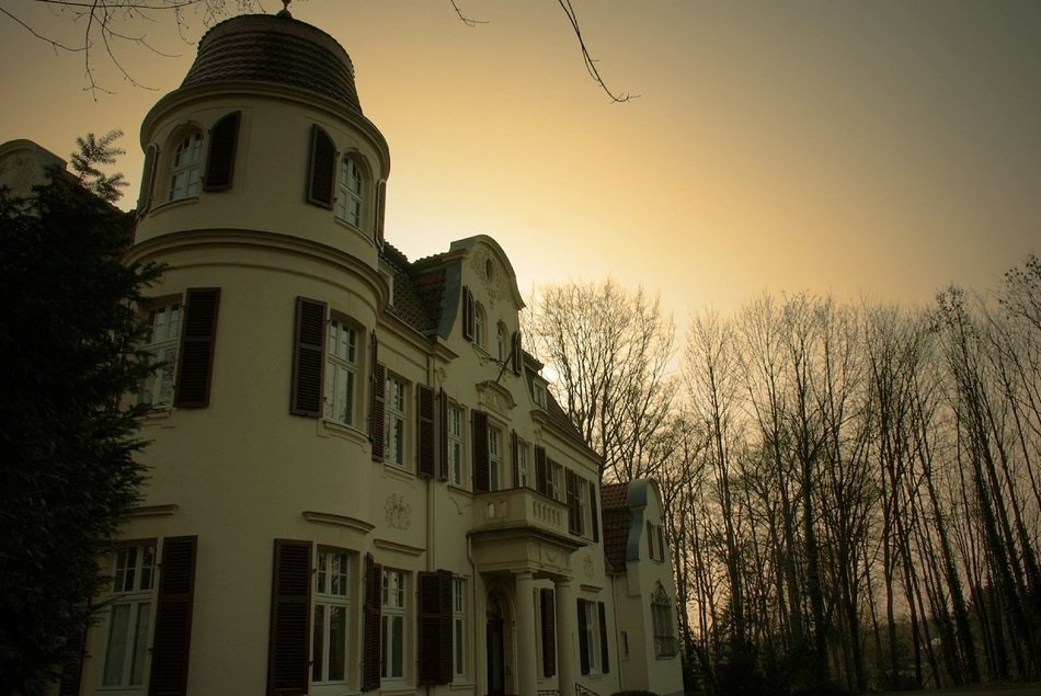 villa with a tower at dusk