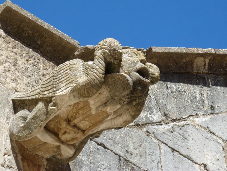 gargoyle sculpture on the facade of Royal Abbey of Santa Maria de Poblet