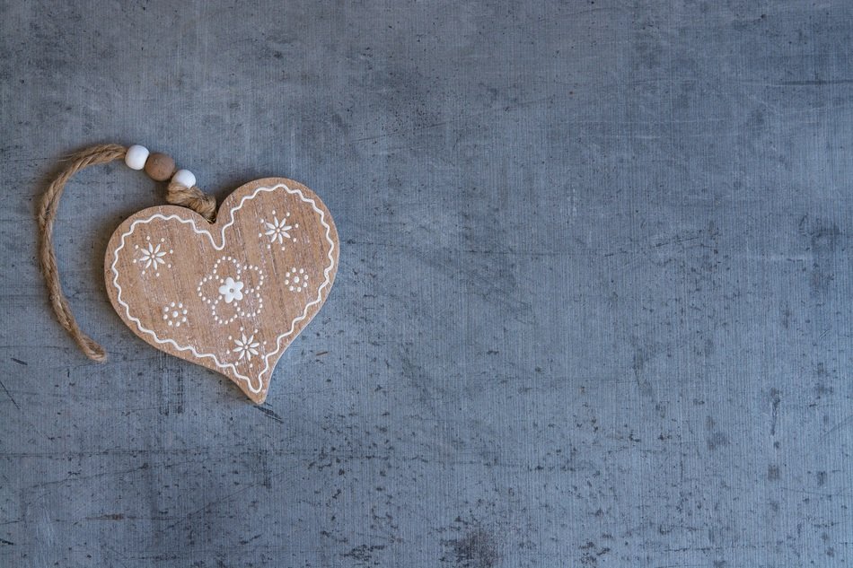 wooden heart on the grey background
