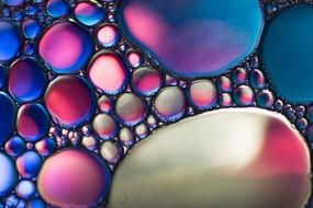 colorful oily spots on the water