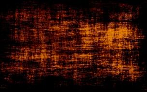 orange scuffs on a black background